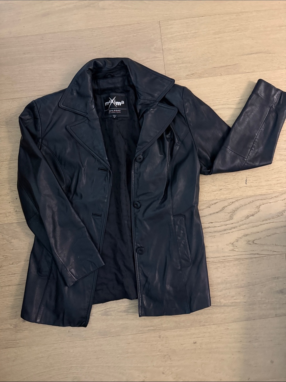 Maxima Wilson’s women’s Black Leather Button-Front Jacket